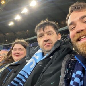 residents and support worker at Man City game