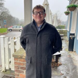 resident in black coat