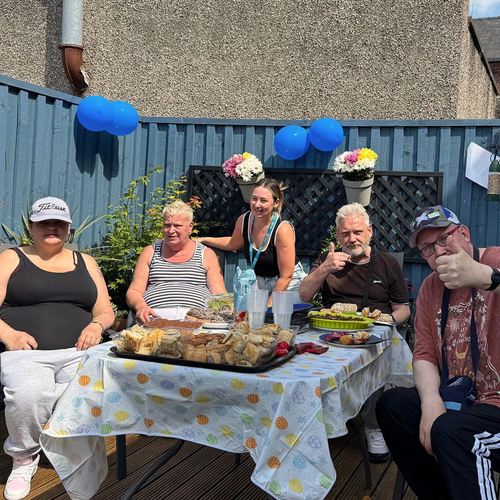 Montgomery House, our supported living service in Bury, Greater Manchester, celebrating the opening of their garden renovation makeover in partnership with Encircle Housing in August 2025.