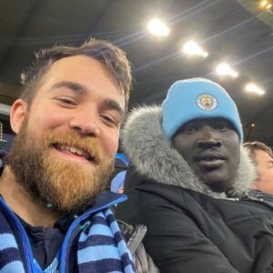 residents and support worker at Man City game