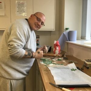 resident making christmas biscuits