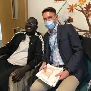 resident with NHC director Ashley Mancey-Johnson