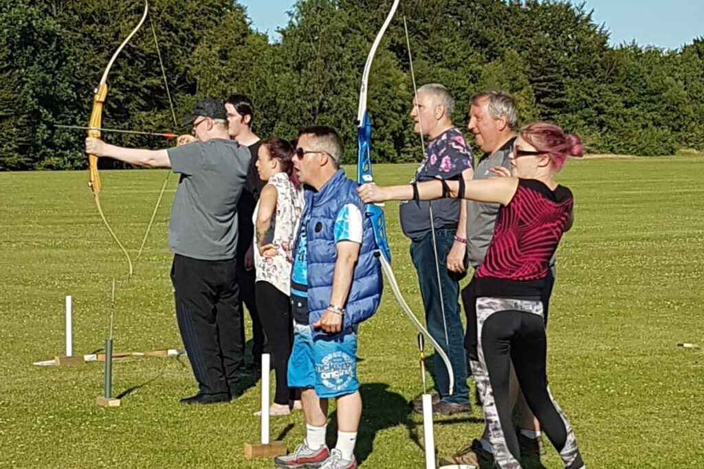 Residents at archery class