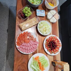 plates of food on wooden table