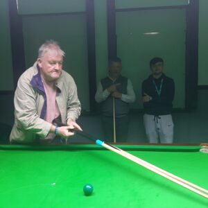 resident playing snooker
