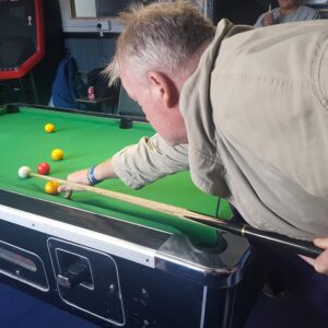 resident playing snooker
