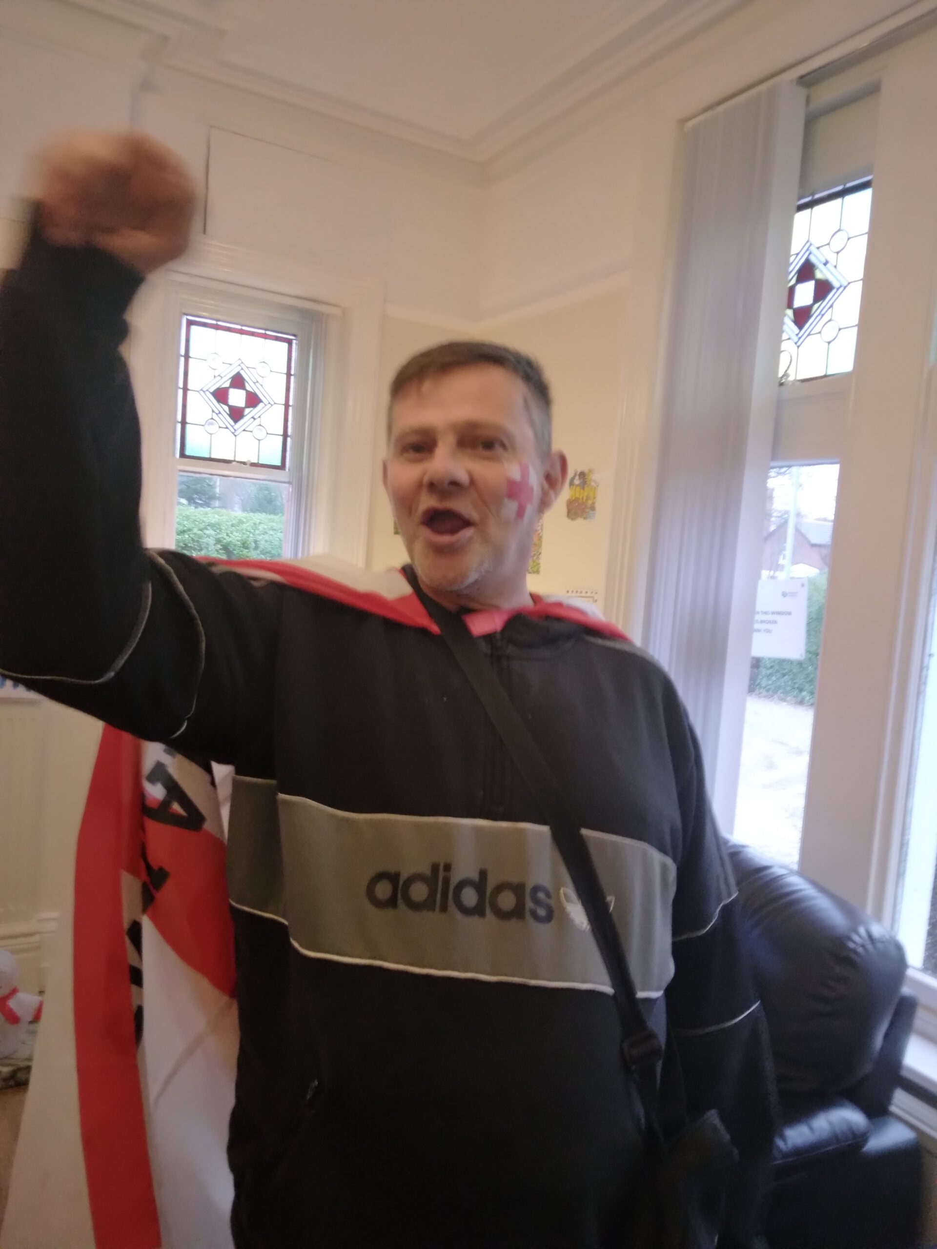 resident cheering on England in World Cup