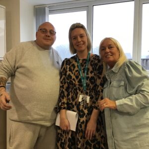 resident and team members in kitchen