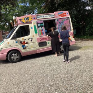 residents getting ice cream from ice cream van