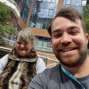 Resident and staff member on a boat