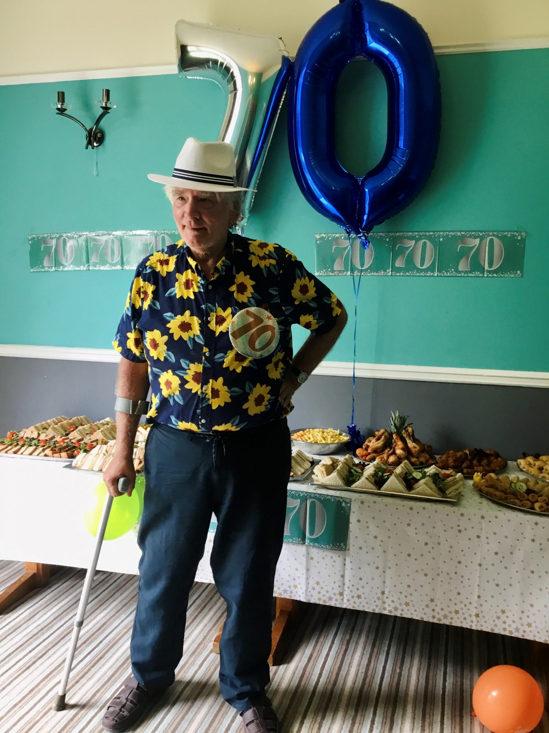 resident in front of 70th balloons