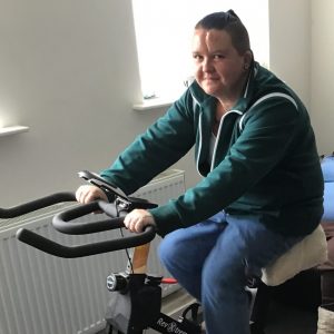 woman on exercise bike