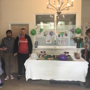 staff and residents at Macmillan coffee morning