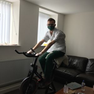 male on exercise bike