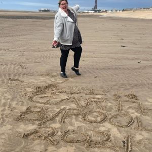 team member on beach