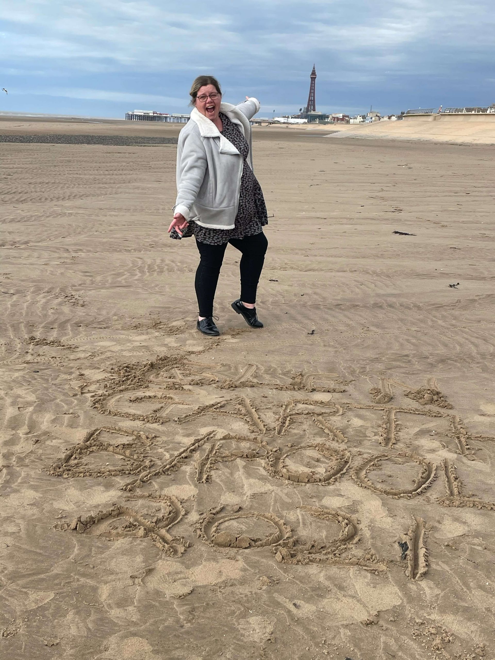 team member on beach