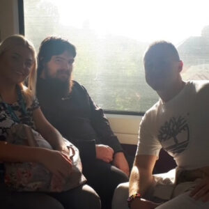 Three residents on a train
