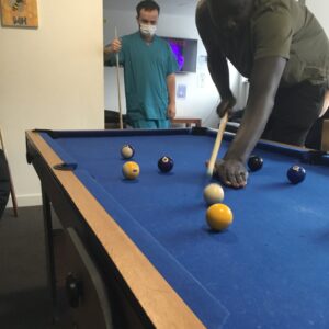 resident playing pool