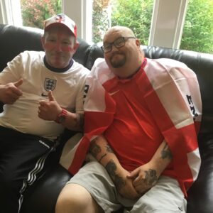 Life at Glen Garth: residents watching the football