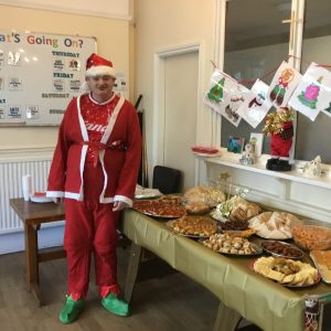 resident dressed in santa outfit