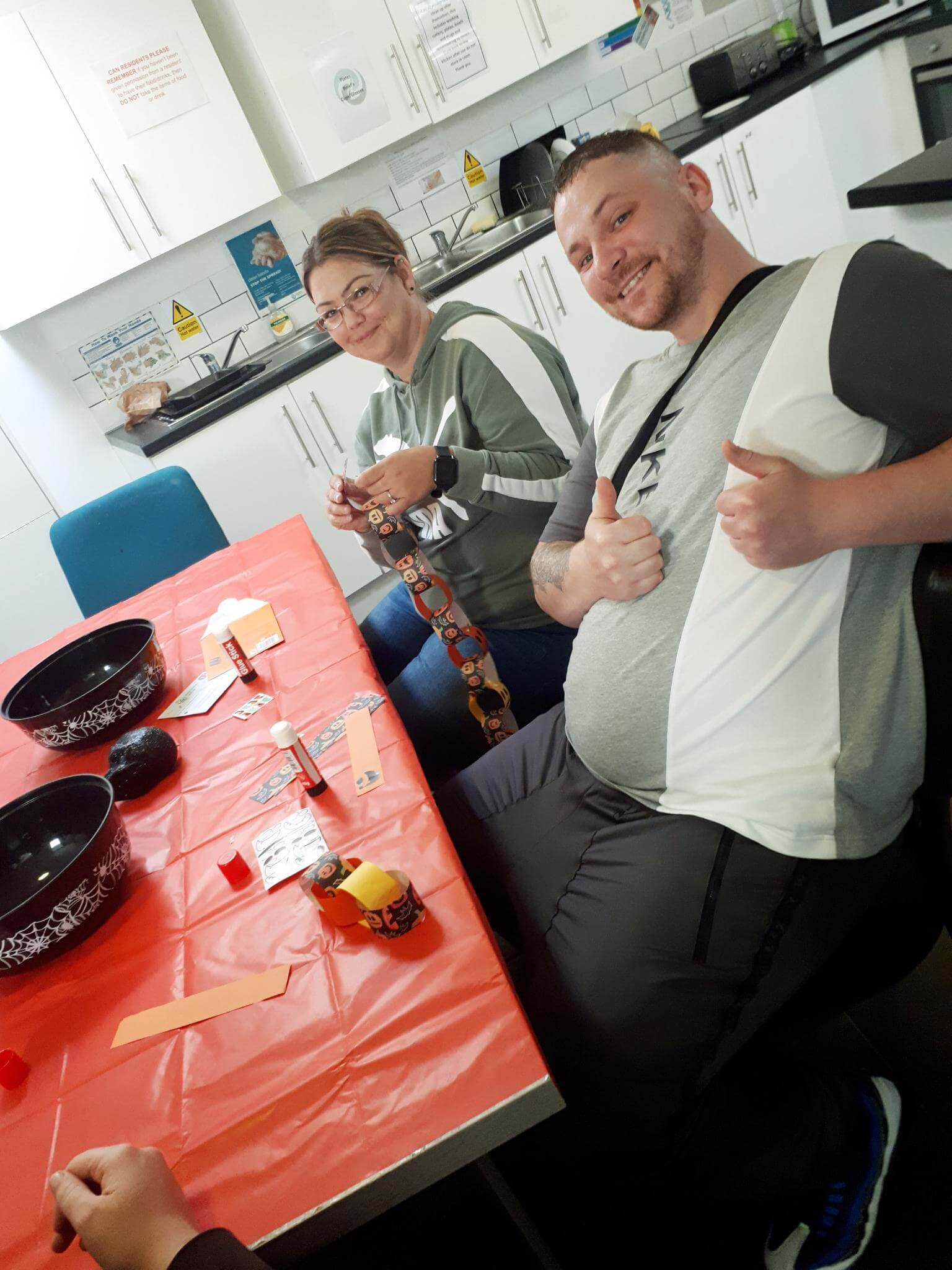 Resident making decorations