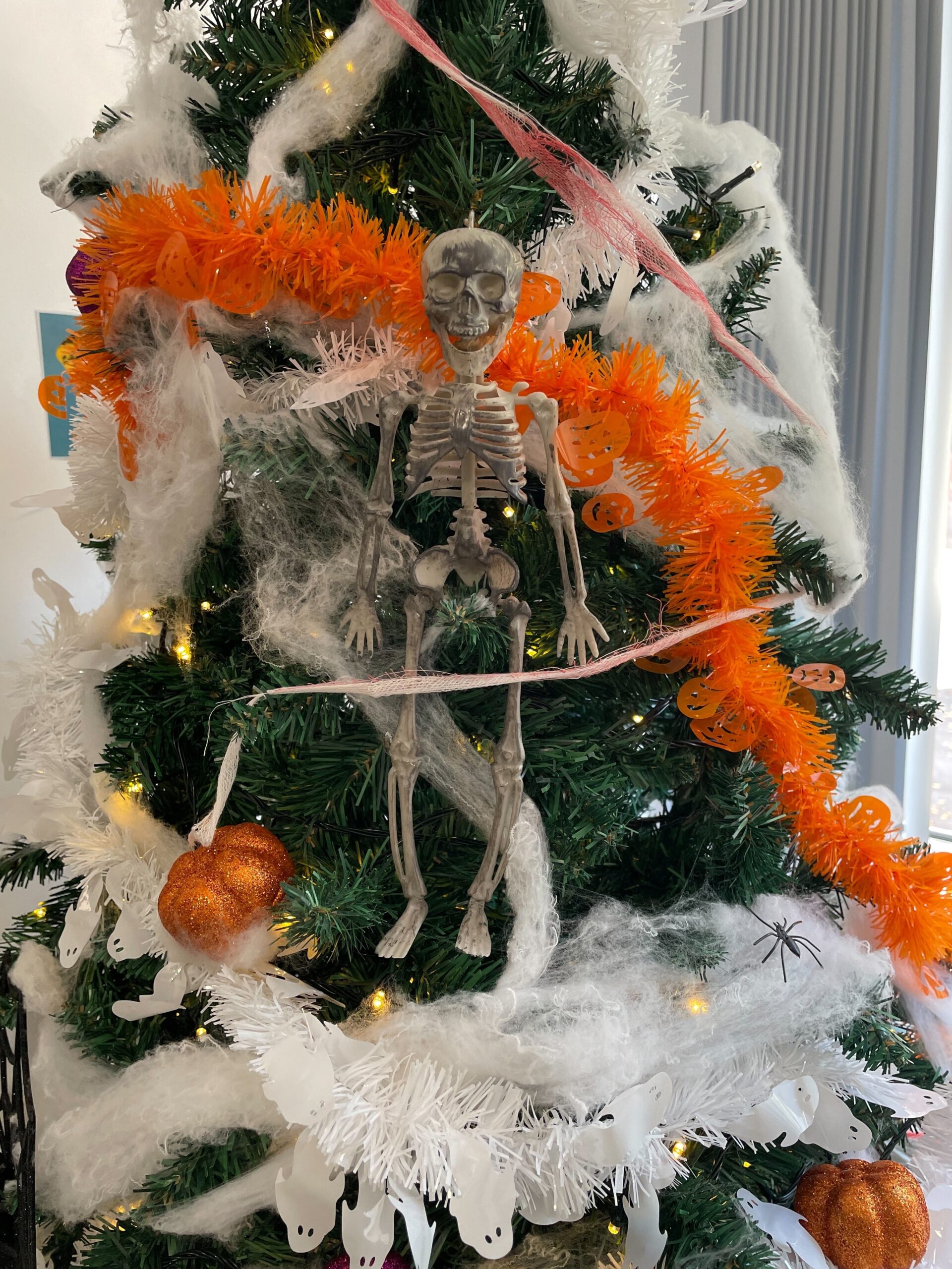 Grainger House Halloween tree close up of skeleton