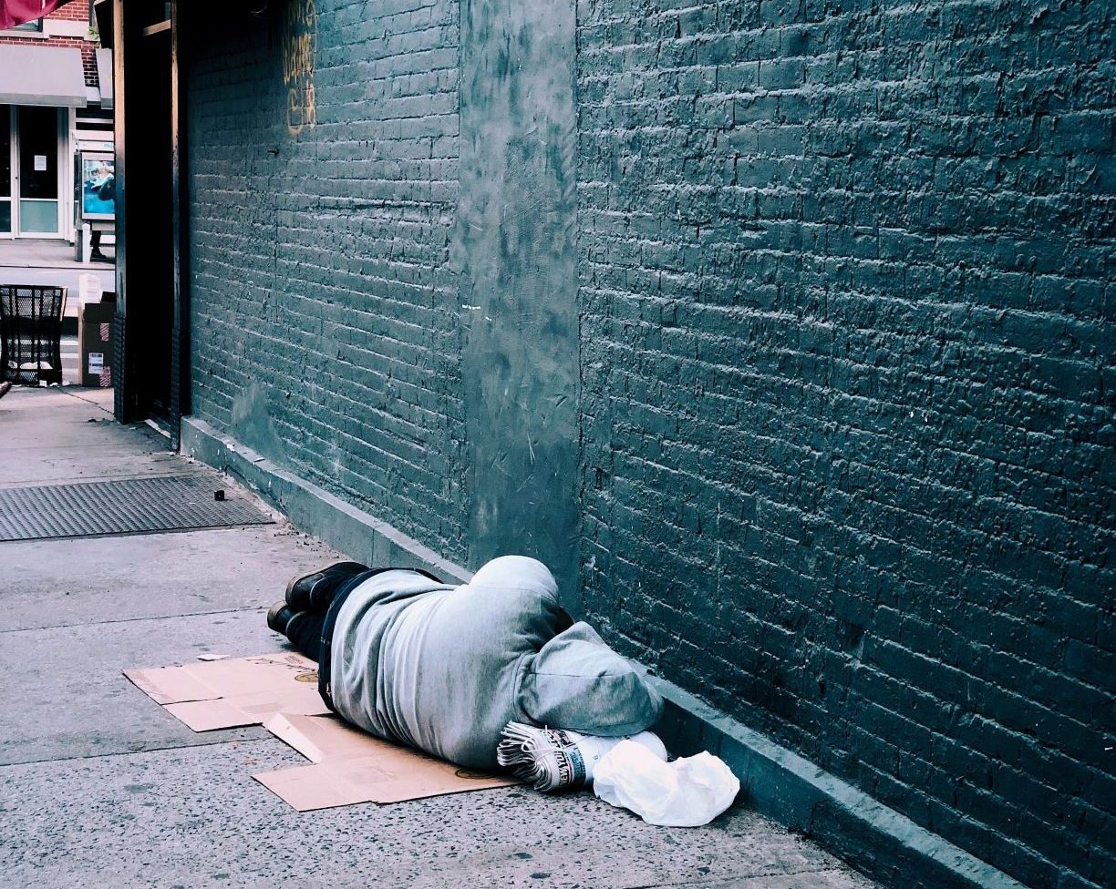 Homeless man sleeping on the streets