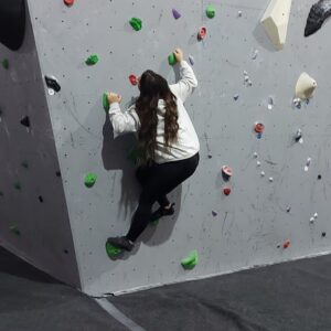 resident on climbing wall