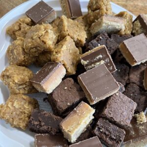 plate of flapjacks and chocolate biscuits