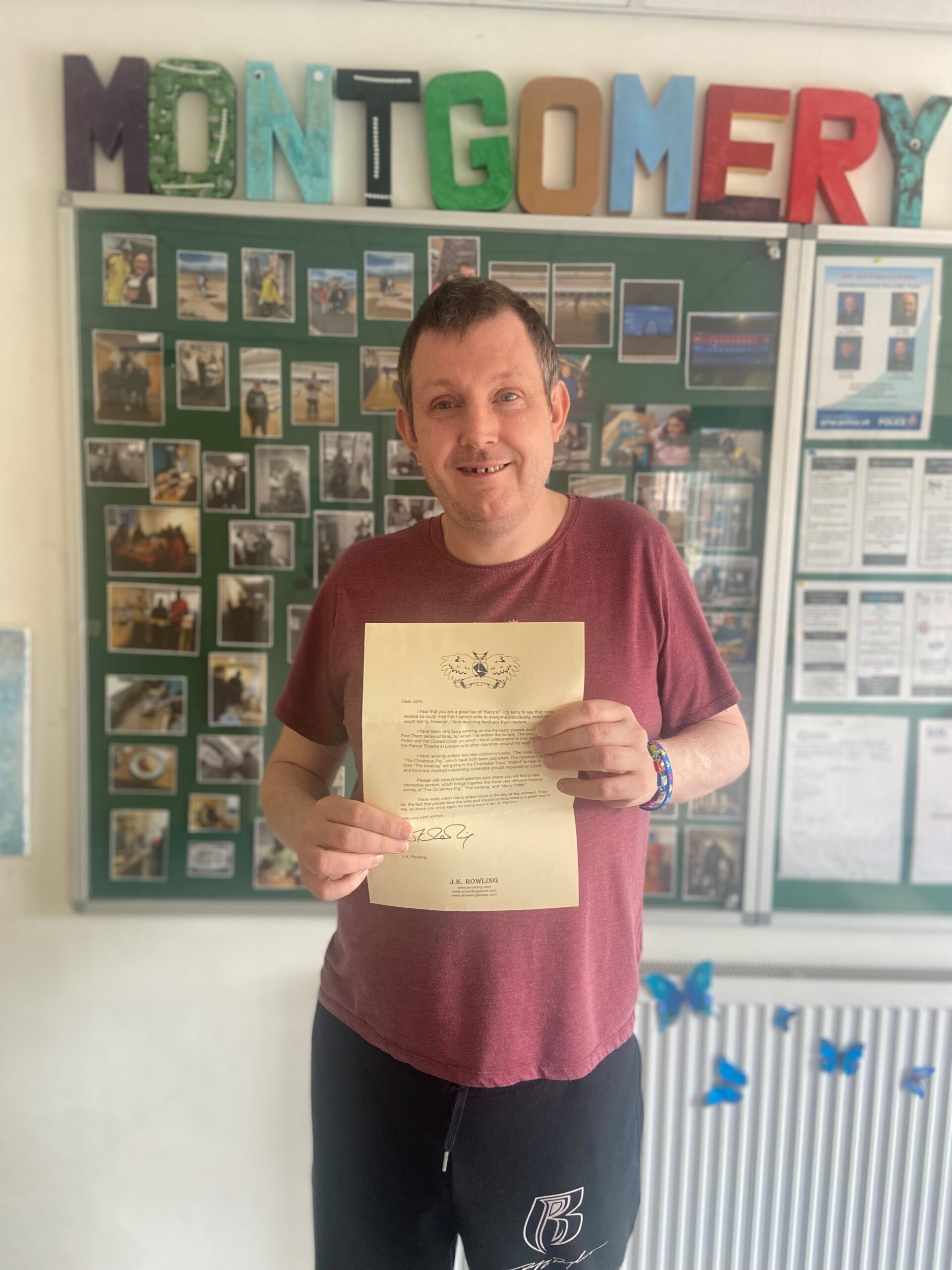 resident holding letter from JK Rowling