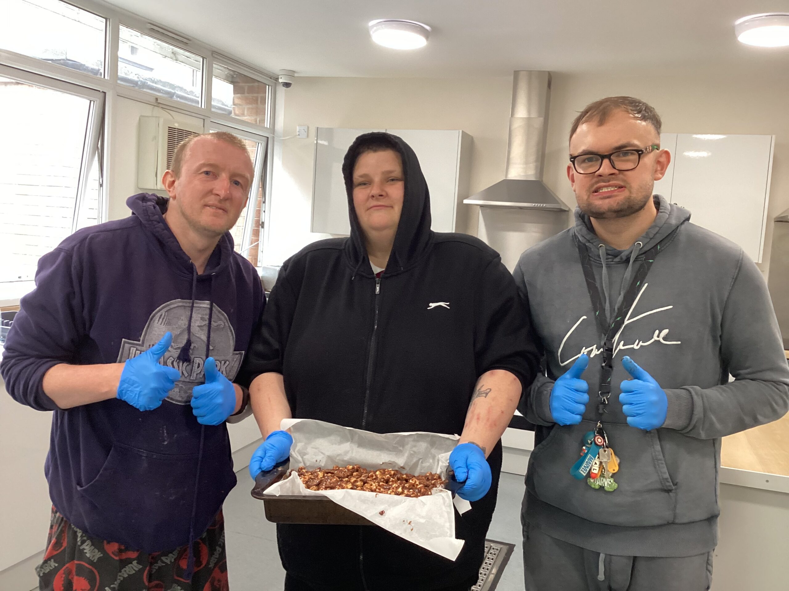 Kirk House residents making rocky road slices