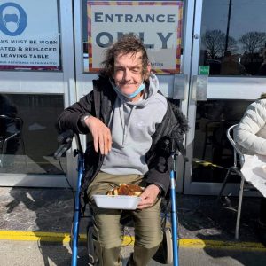 resident enjoying fish and chips