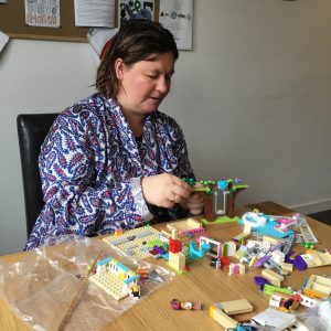 resident making lego