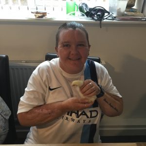 resident holding a chick