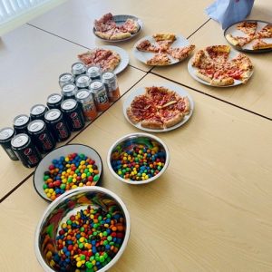 pizza and bowls of skittles