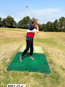 resident playing golf