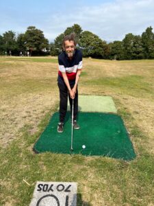 resident playing golf