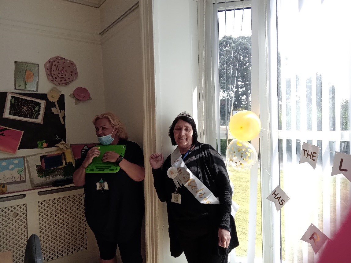 Brenda wearing retirement sash