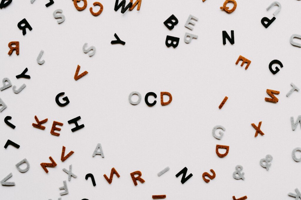 jumble of letters with word OCD in the middle