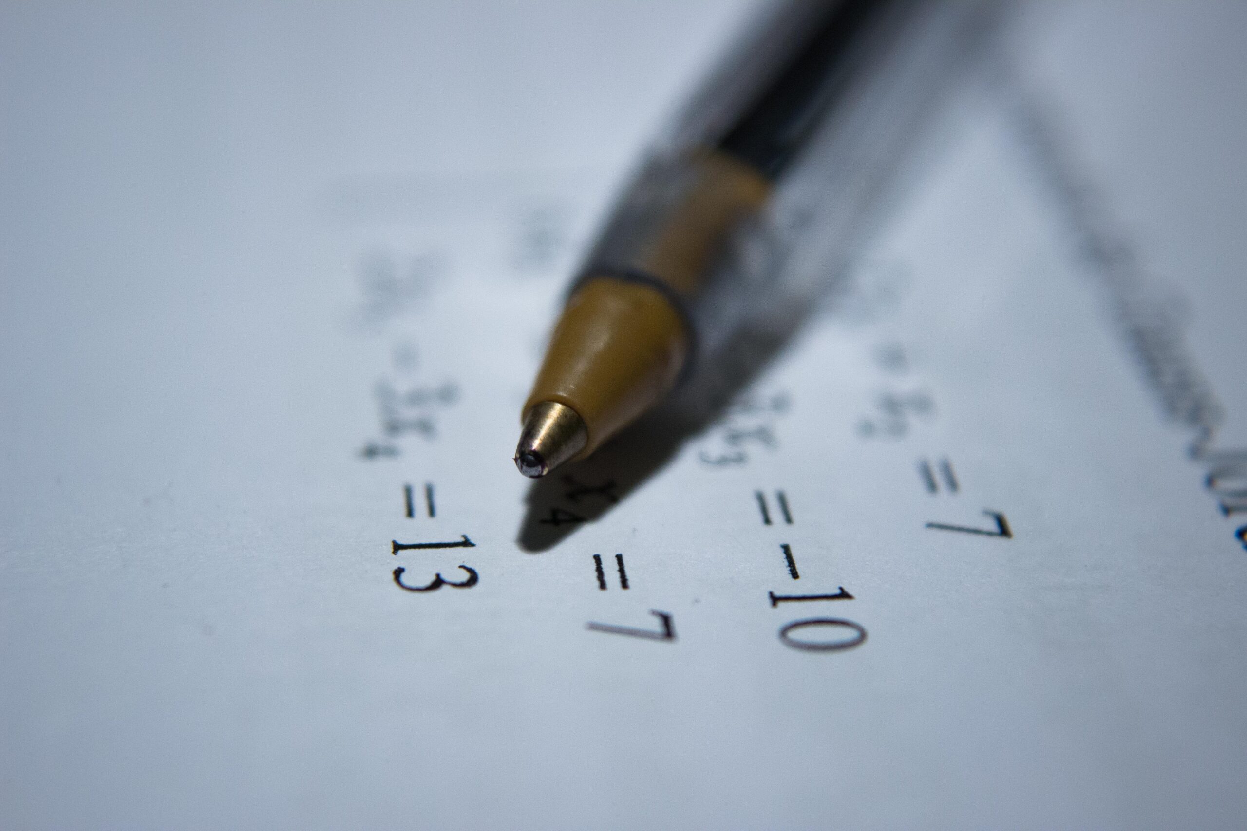 dyscalculia: pen on paper with maths equations