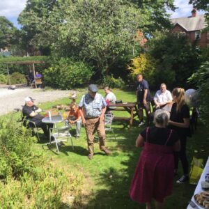 residents enjoying bbq in garden
