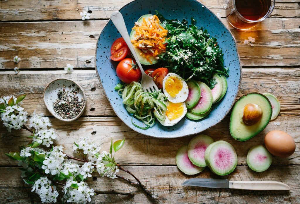 nutrition and mental health: plate of food on wooden board