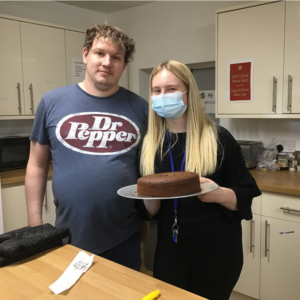 resident making chocolate cake