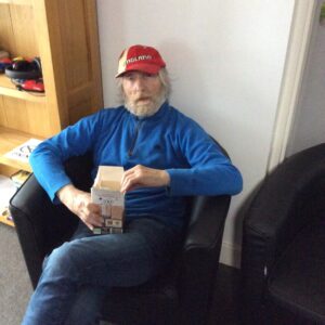 male in blue jumper with easter egg