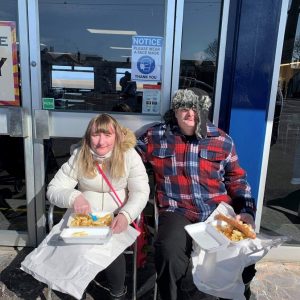 residents enjoying fish and chips