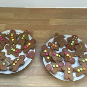 2 plates of homemade vegan gingerbread biscuits