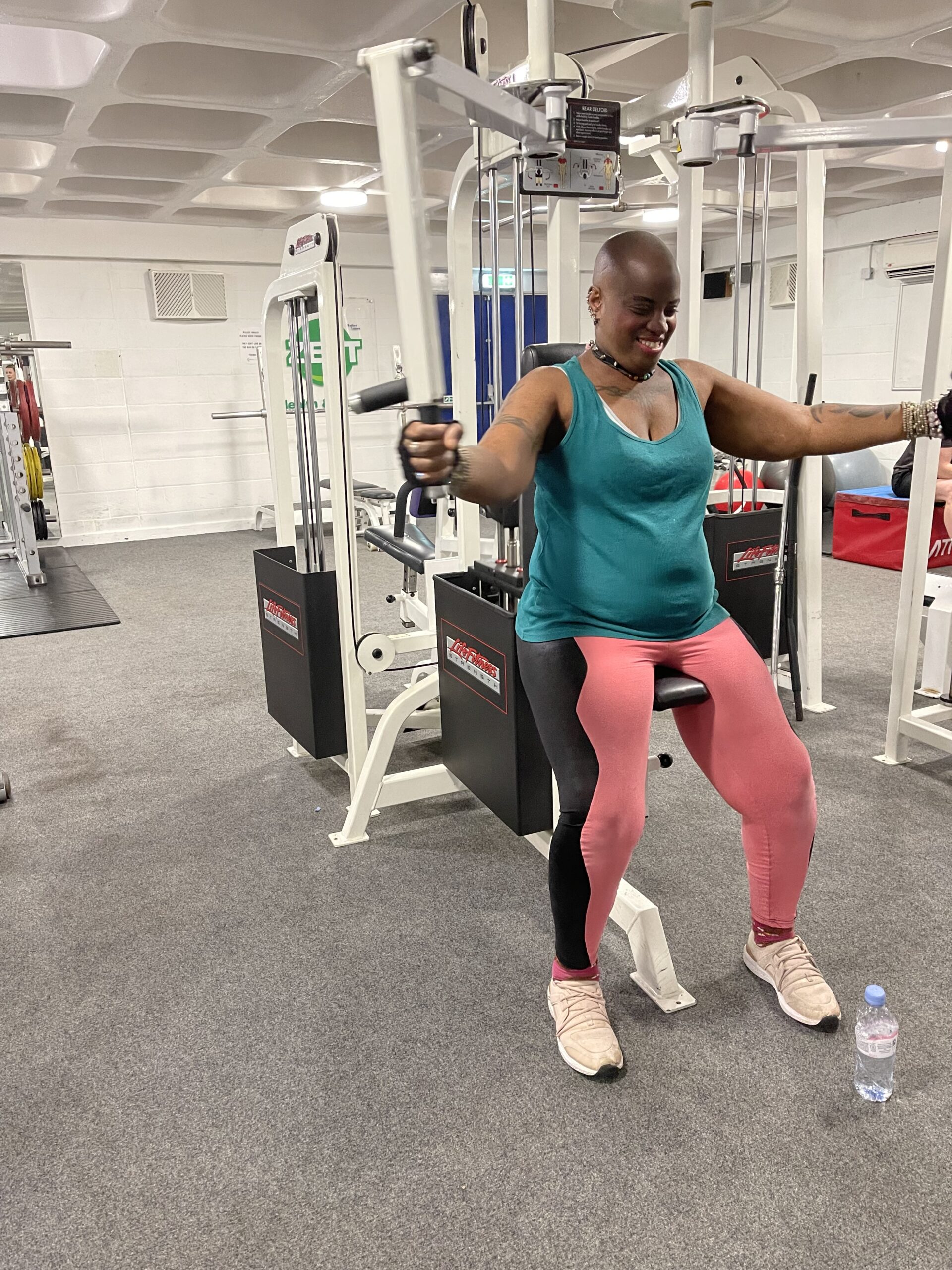 resident on chest press machine