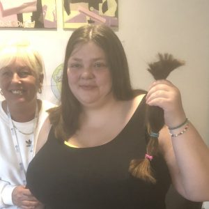 resident holding hair