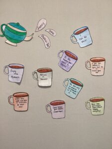 coffee cup paper decorations on wall