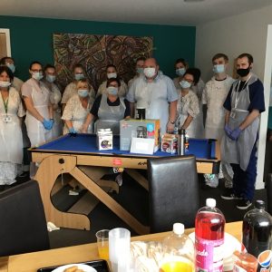 Team members dressed in PPE